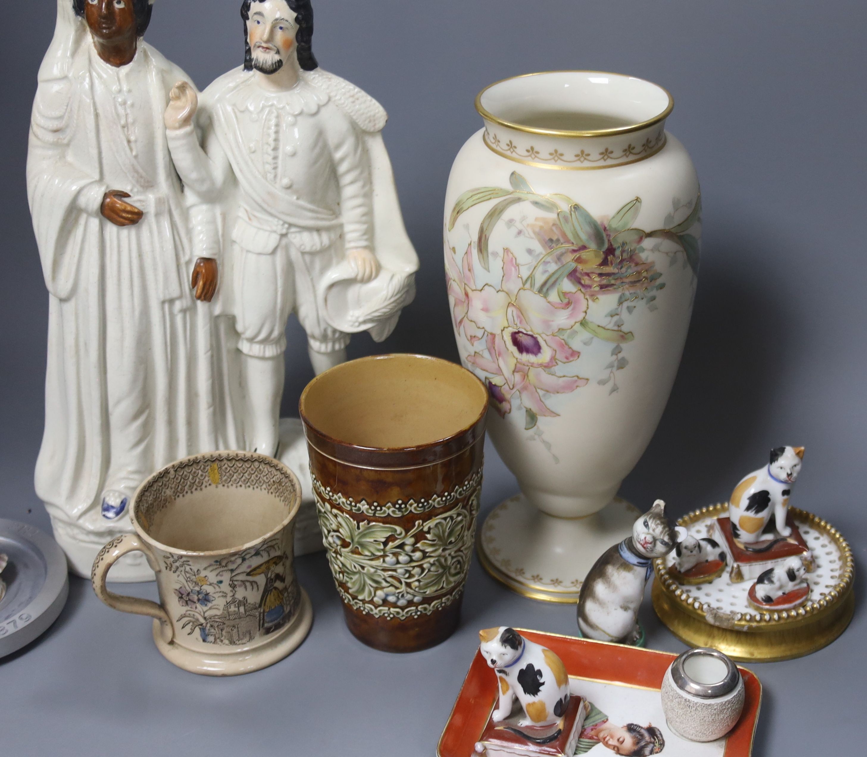 Mixed ceramics including a Staffordshire flat back ‘Othello & Iago, various cat and dog figures, a Doulton stoneware beaker etc.